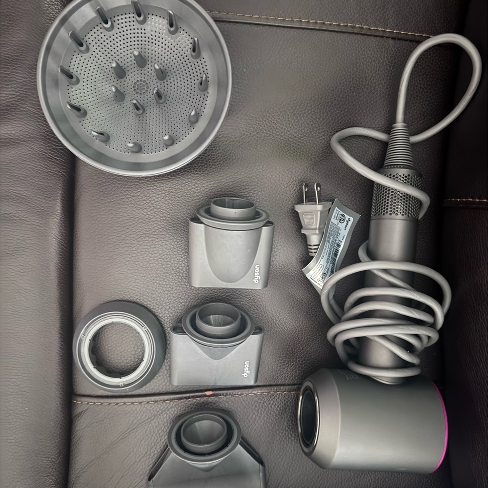 Dyson Supersonic hair dryer with attachment